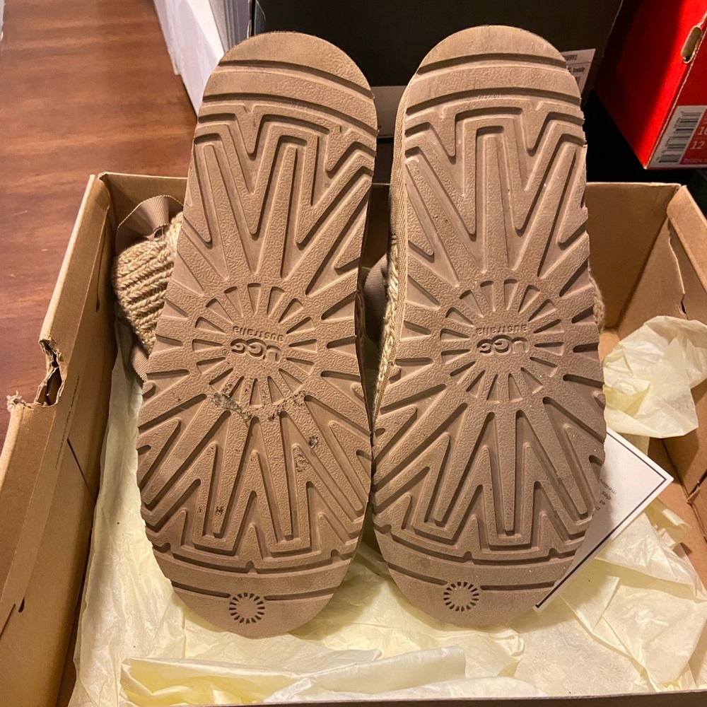 Size 8 Ugg boots worn once with certificate of authenticity mint condition